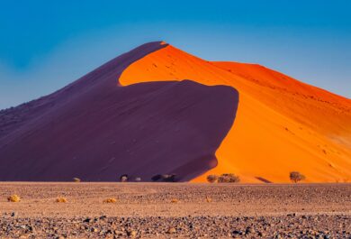 A large dune during a sunset in the Namib Desert.