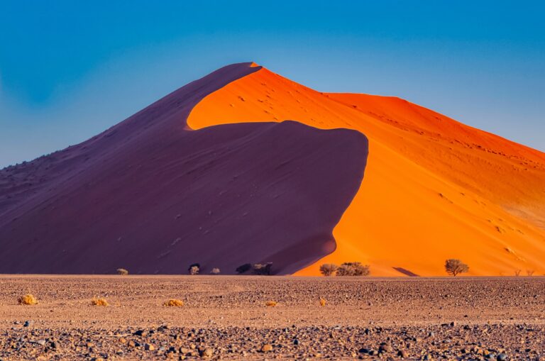 A large dune during a sunset in the Namib Desert.