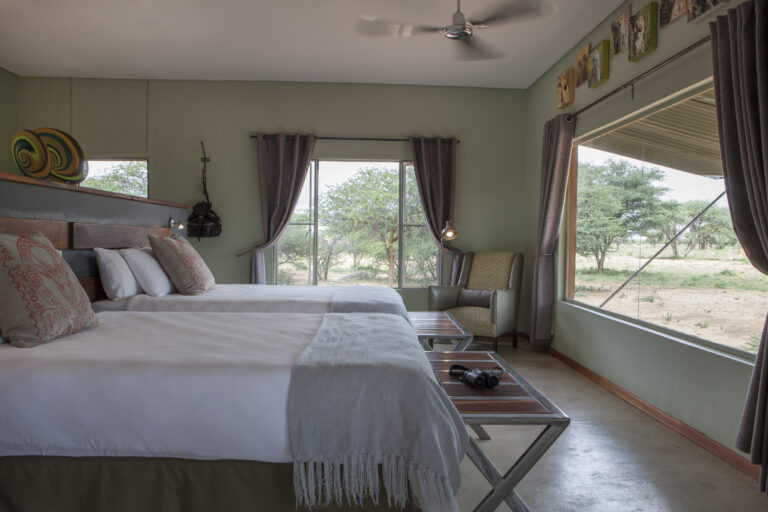 A side view of a room at the Okonjima Plains Camp.
